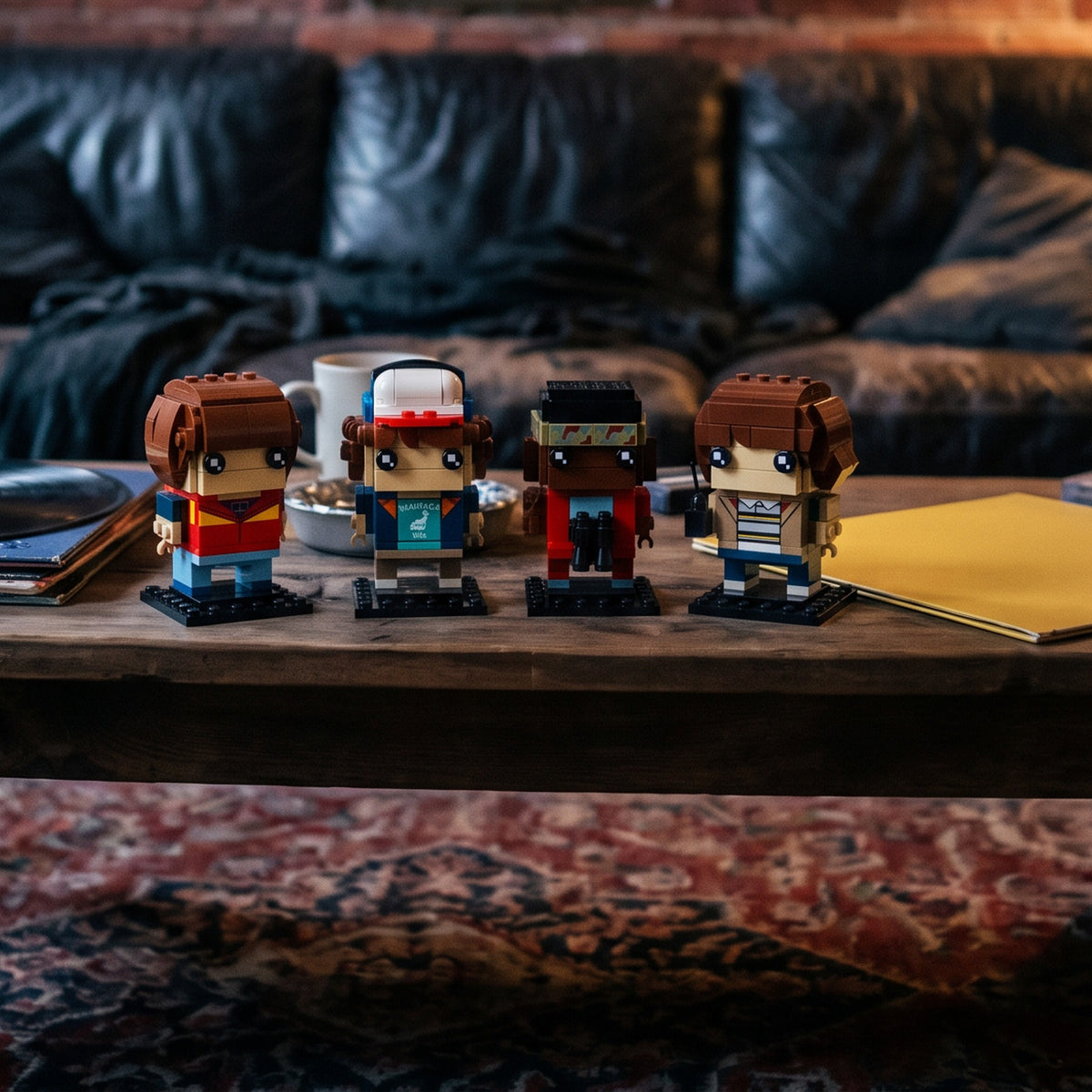 Brick-built Mike, Dustin, Lucas and Will from Stranger Things standing on a rustic coffee table in a moody brick-wall living room
