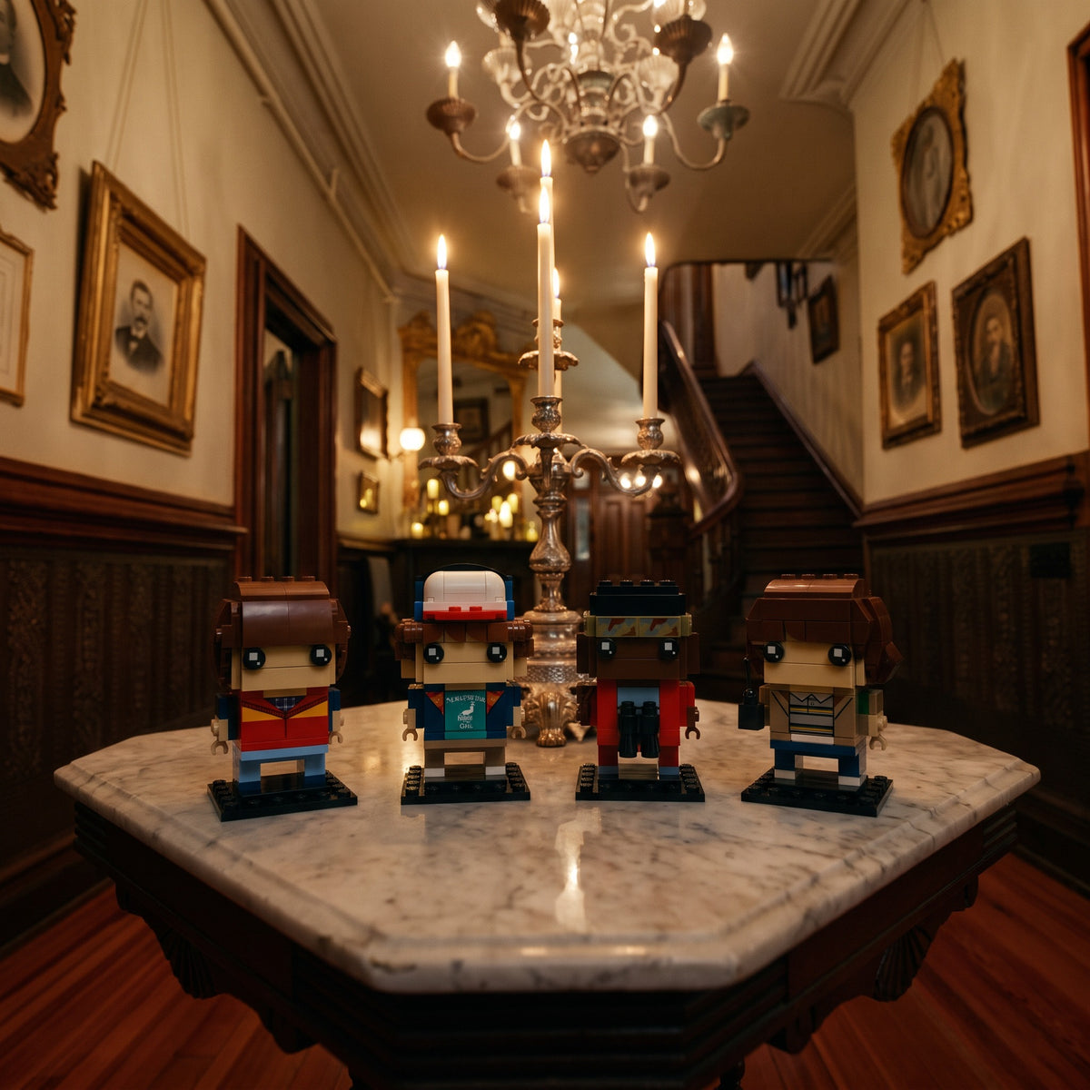 Brick-built Mike, Dustin, Lucas and Will from Stranger Things on a marble hall table in front of a lit candelabra in a Victorian hallway
