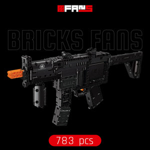 Black brick-built toy rifle model with orange tip, 783 pieces