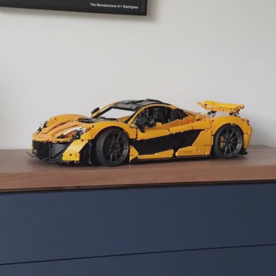 Оранжевый спортивный автомобиль P1 (3893) деталей)